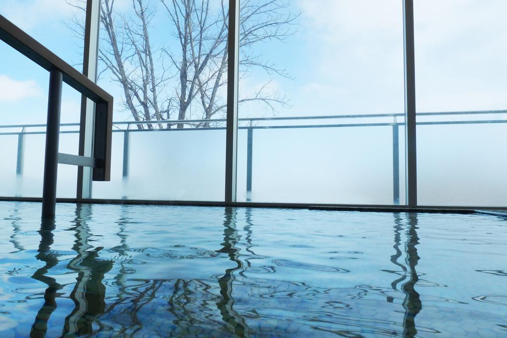 Shin Furano Prince Hotel Εξωτερικό φωτογραφία A view of the indoor pool